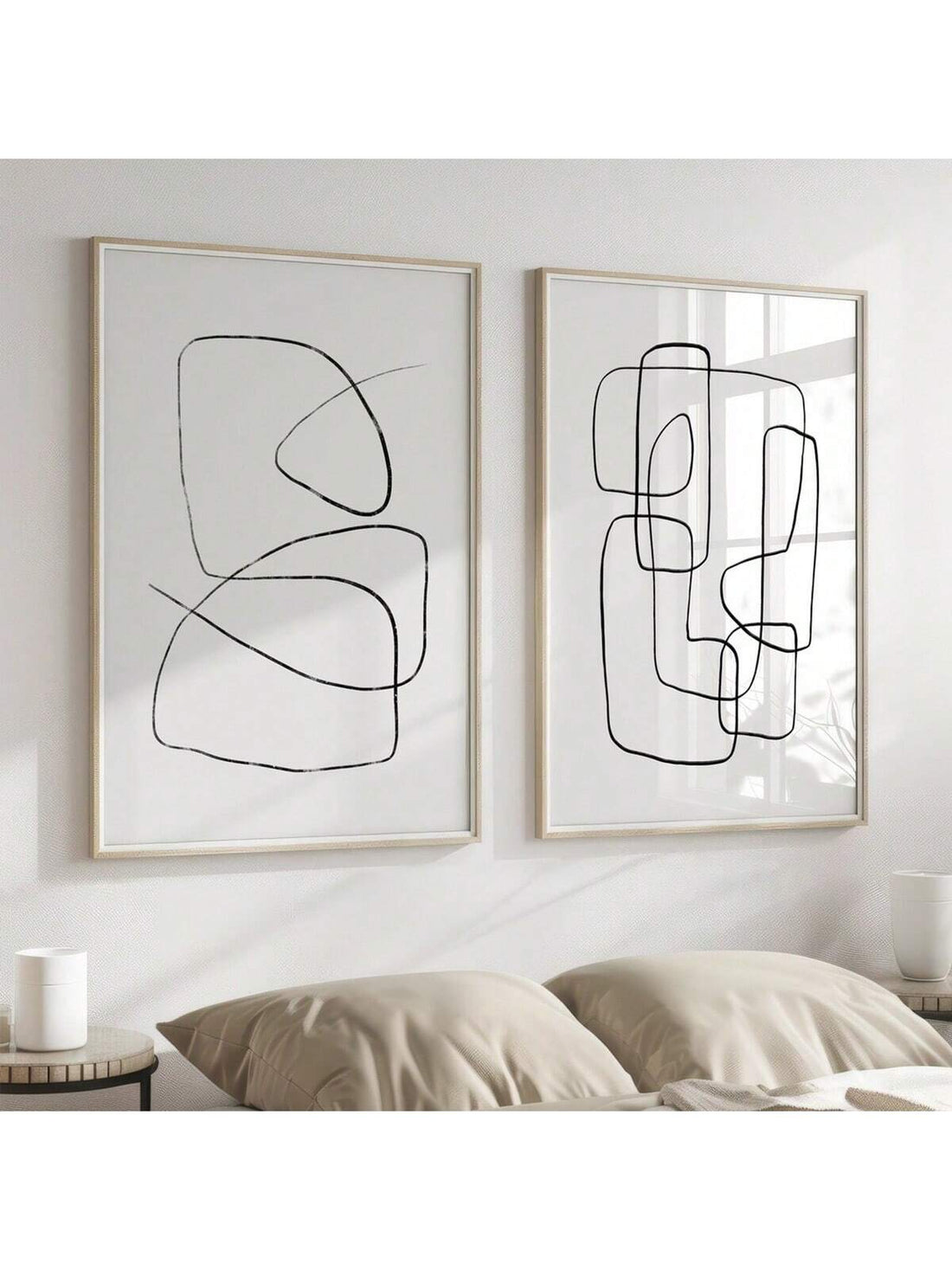 This set of two elegant, modern, minimalist line art prints adds a touch of sophistication to any space. The black and white abstract designs are printed on high-quality canvas, creating a stunning wall decor piece. Elevate your home or office with this timeless and stylish addition.