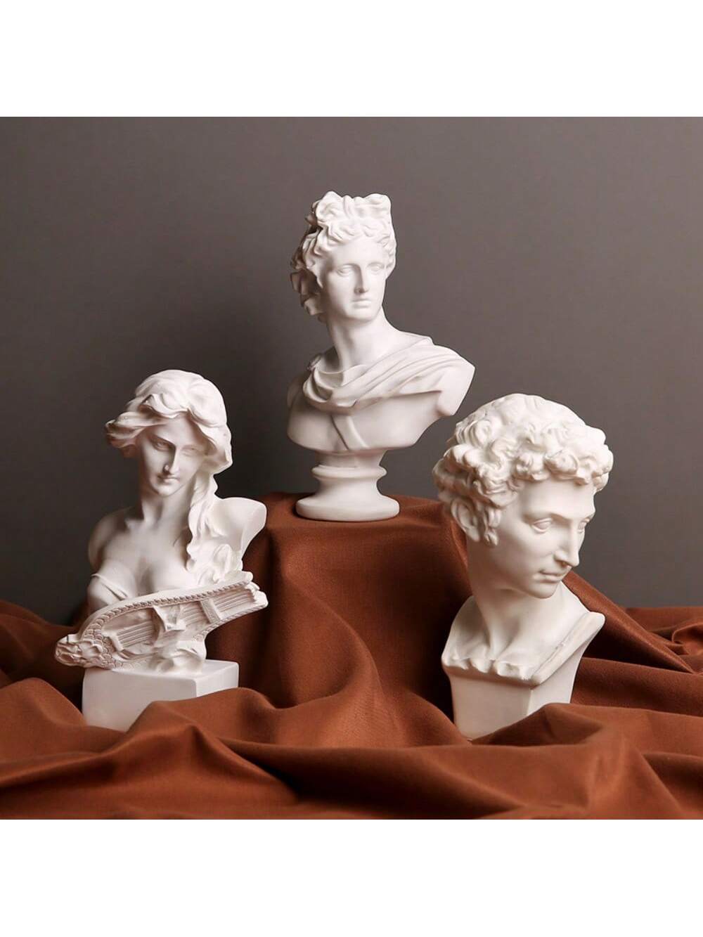 Experience the sophistication of ancient Greek art with our Elegant Nordic Greek Figure Statue. Carefully crafted in the likeness of David, renowned for his musical abilities, and designed to add a touch of artistic flair to your home decor. Made with high-quality materials for a timeless and elegant addition to any space.