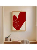Transform your space with this striking wall art piece that combines contemporary typography with timeless romance. Featuring a bold red heart design paired with an elegant love quote, this minimalist poster brings warmth and sophistication to any room.