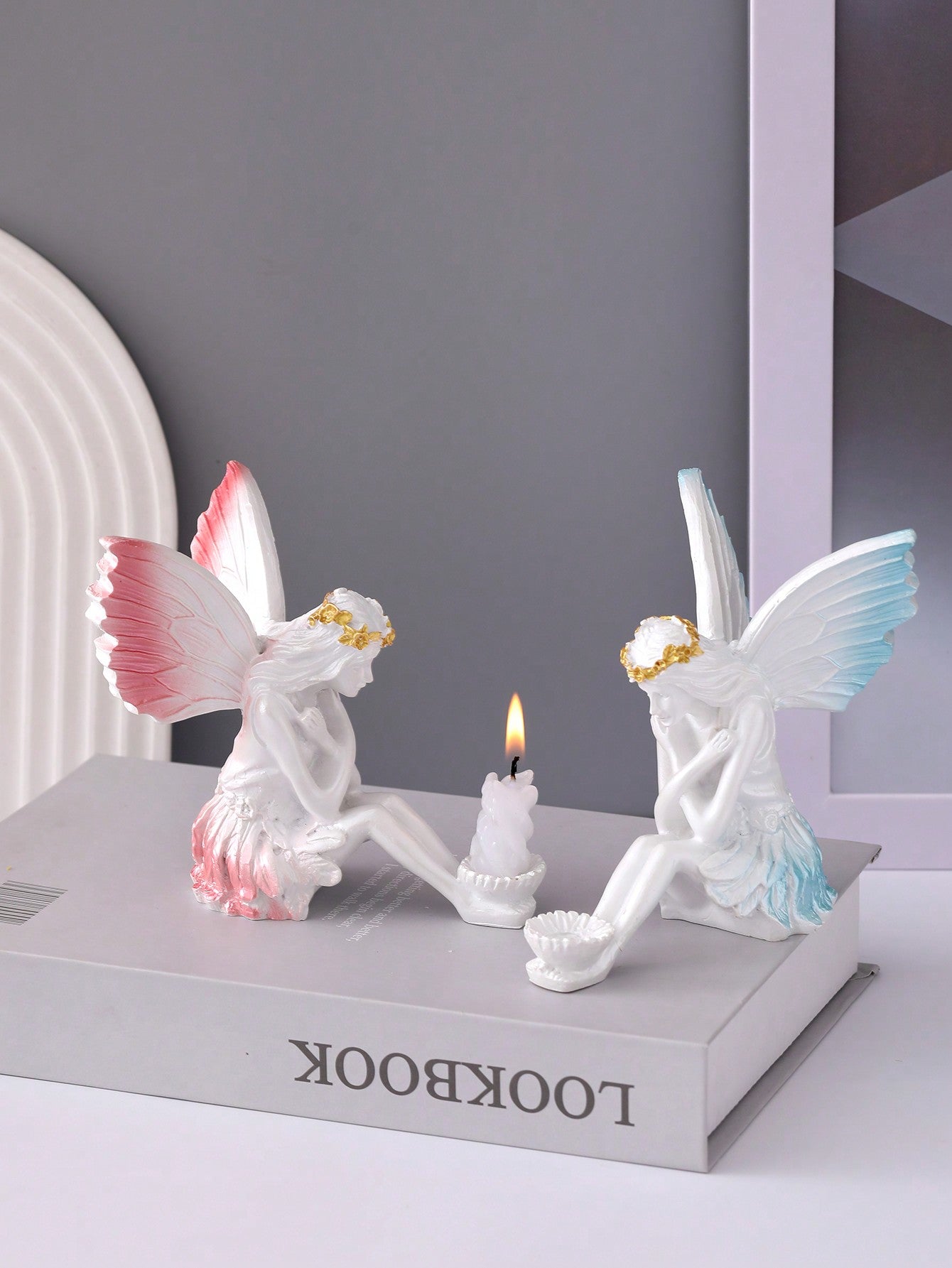 Crafted with intricate details, this Elegant Resin Angel Statue is a must-have for any home decor. Its timeless design adds a touch of elegance to any room, making it the perfect accent piece for your living room, bedroom, or entryway. Made with high-quality resin, this statue is durable and long-lasting.