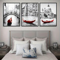 Transform your space with this stunning Venice Gondola Canvas Art Set, featuring striking black and white photography elevated by bold red accents. Perfect for modern interiors, this sophisticated piece captures the romance of Venice in a contemporary aesthetic. Available as both framed and unframed options to suit your décor style. The high-quality canvas construction is waterproof, ensuring durability and longevity. Ideal for dining rooms, living spaces, or any area seeking an elegant focal point. Bring t