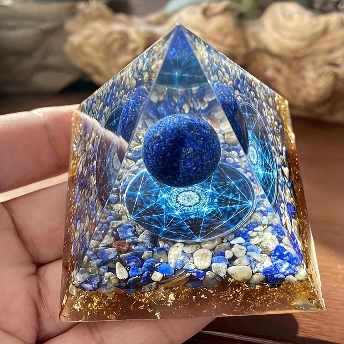 Elevate your space with the Lapis Lazuli Positive Energy Pyramid. Crafted from natural epoxy, this desk decoration radiates positive energy and promotes a sense of calm and balance. Perfect for any workspace, it adds a touch of beauty and serenity to your day.