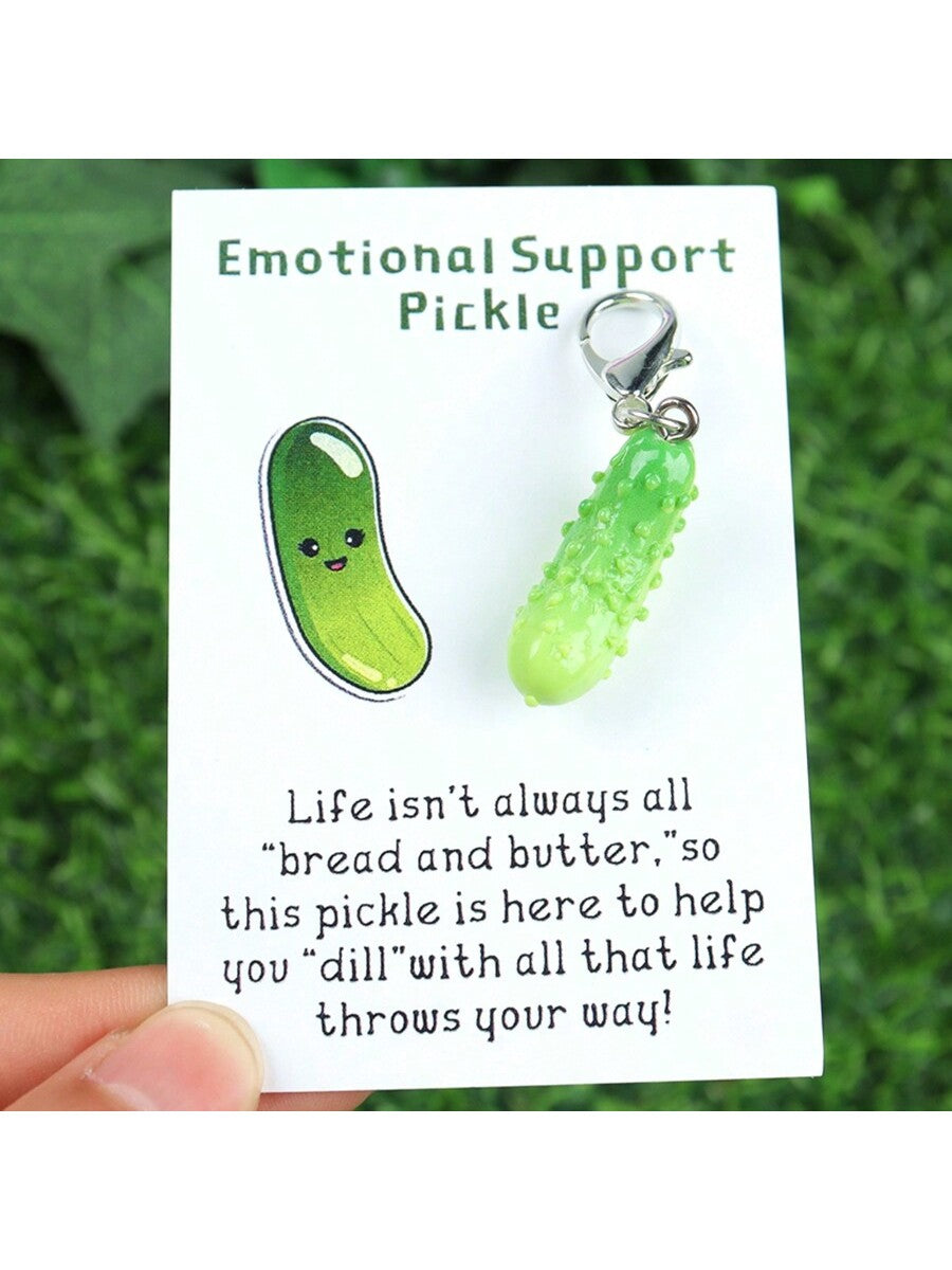 Introducing the Emotional Support Pickle Keychain: the perfect gift for any occasion! This fun and uplifting keychain will bring a smile to anyone's face, providing a much needed emotional boost whenever it's needed. Made with high-quality materials and designed to last, this keychain is a thoughtful and unique way to show someone you care.