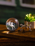 Illuminate your home with the Enchanted Moon Fairy Crystal Ball. This exquisitely detailed 3D laser engraved statue adds a touch of magic to any room. Perfect for home décor or party decoration, this crystal ball is sure to captivate with its intricate design and enchanting beauty.