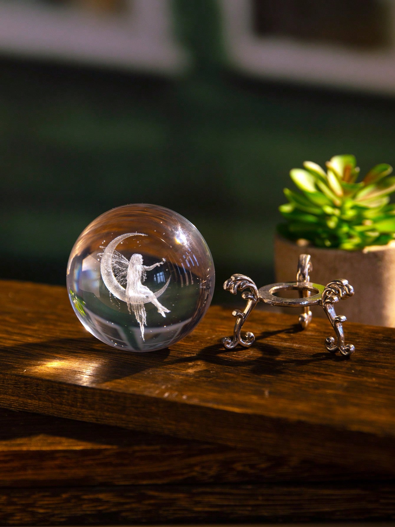 Illuminate your home with the Enchanted Moon Fairy Crystal Ball. This exquisitely detailed 3D laser engraved statue adds a touch of magic to any room. Perfect for home décor or party decoration, this crystal ball is sure to captivate with its intricate design and enchanting beauty.
