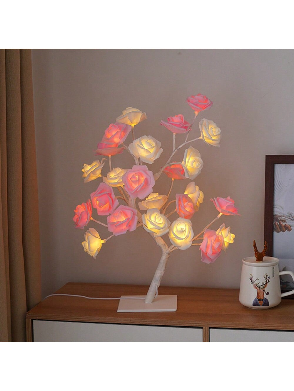 Introducing the Enchanting Rose Tree Light, the perfect home decoration for girls, women, and teens. With its beautiful and delicate rose design, this light adds a touch of enchantment to any room. Enhance your space with the soft and warm glow, creating a cozy and inviting atmosphere. Perfect for bedrooms, living rooms, or any space in need of a touch of elegance.