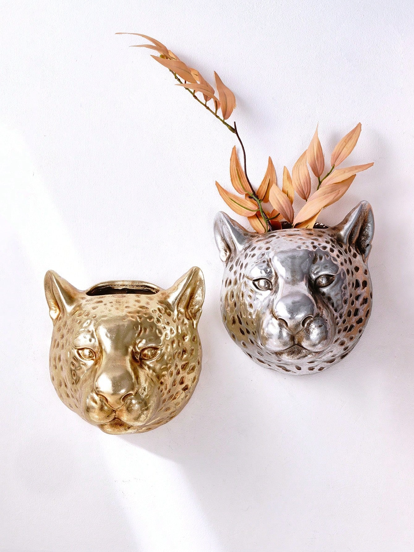 Add some wild and unique charm to your home with our European Vintage Leopard Head Wall Decor. This eye-catching piece of art will elevate any room with its creative and lovely design. Made of high-quality materials, this decorative piece is a must-have for any animal lover.