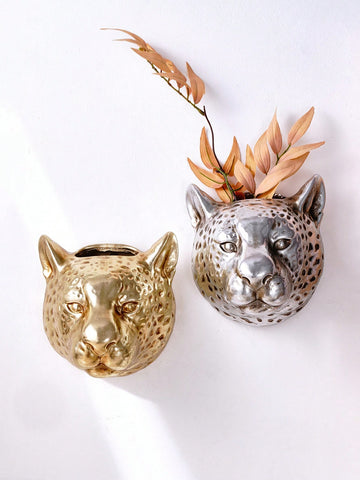 Add some wild and unique charm to your home with our European Vintage Leopard Head Wall Decor. This eye-catching piece of art will elevate any room with its creative and lovely design. Made of high-quality materials, this decorative piece is a must-have for any animal lover.