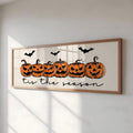 Front view of framed Halloween wall sign with pumpkins, bats, and seasonal lettering