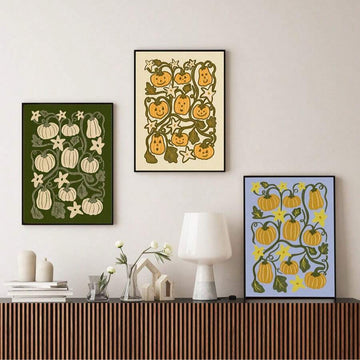 Fall pumpkin and jack-o-lantern poster trio on console