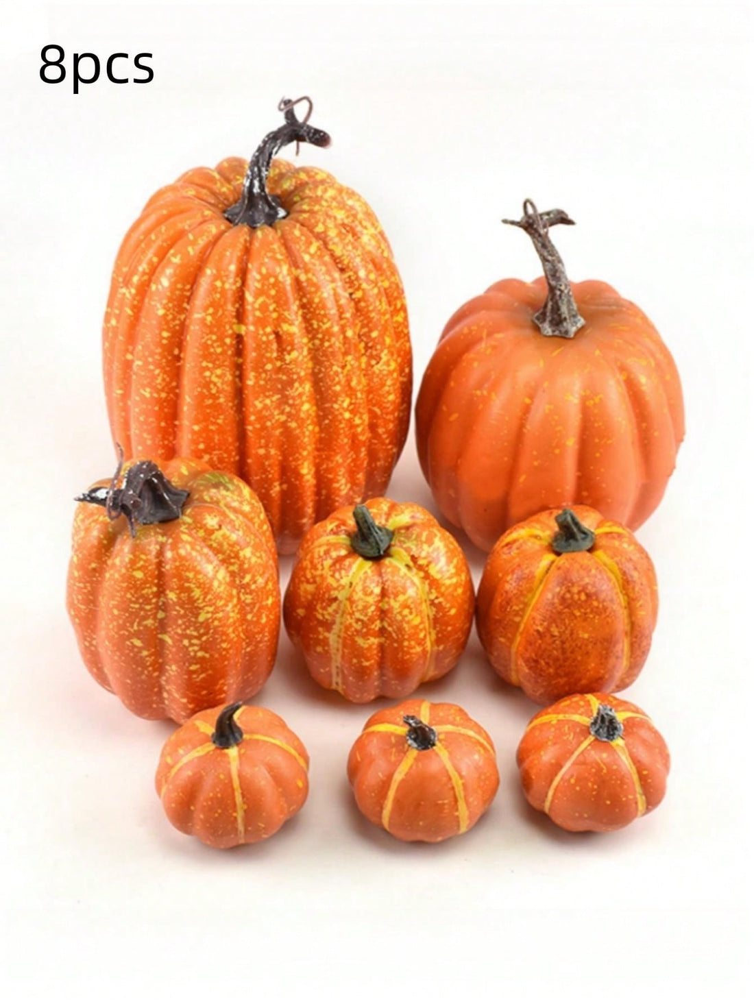 Add a touch of festive charm to your home this fall with our 7-8 piece set of assorted sized artificial fake orange pumpkins. Perfect for both Thanksgiving and Halloween decorations. Made with high-quality materials for a realistic look. Upgrade your seasonal decor with ease.