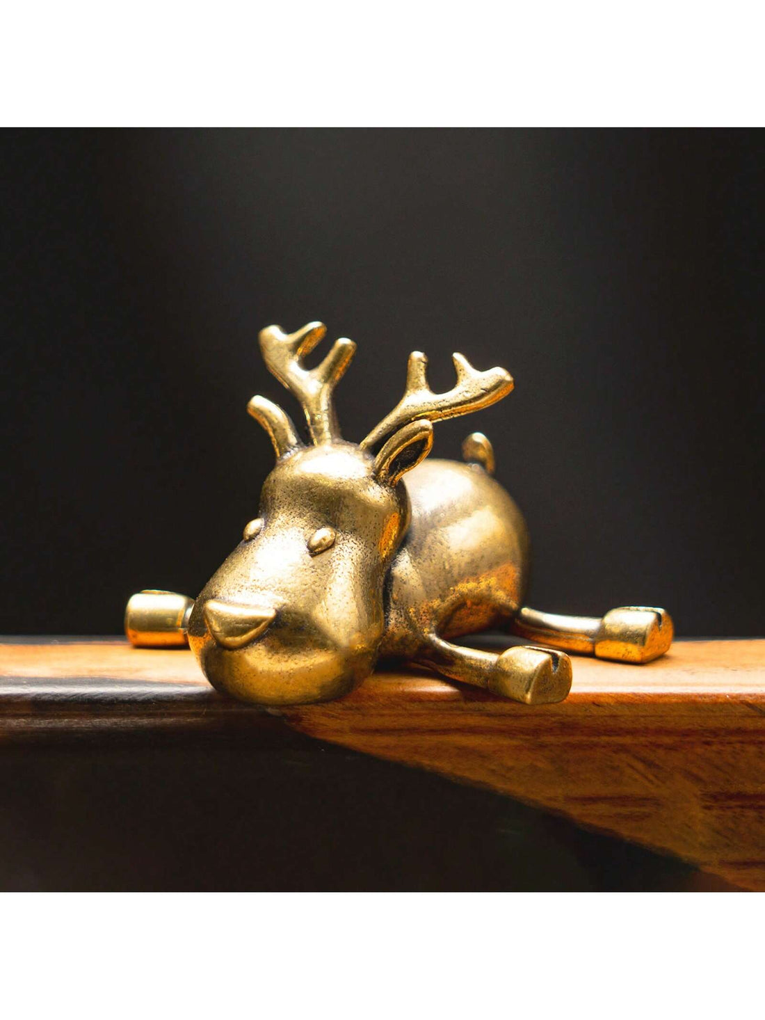 This vintage brass mini reindeer statue is the perfect addition to your winter decor. With its festive design, it adds an enchanting touch to any home or office space. Crafted with high-quality materials, this statue is durable and long-lasting. Elevate your holiday decor with this charming reindeer statue.