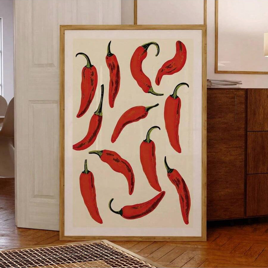Unframed canvas artwork featuring twelve red chili peppers on a cream background