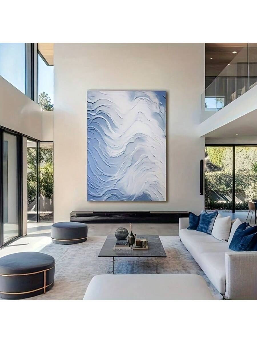 Elevate your interior design with this sophisticated frameless blue and white abstract canvas painting. The fluid interplay of cool tones creates a serene focal point while complementing contemporary décor schemes. Museum-quality canvas ensures lasting vibrancy, allowing this versatile piece to transform living rooms, bedrooms, or office spaces with its artistic presence.