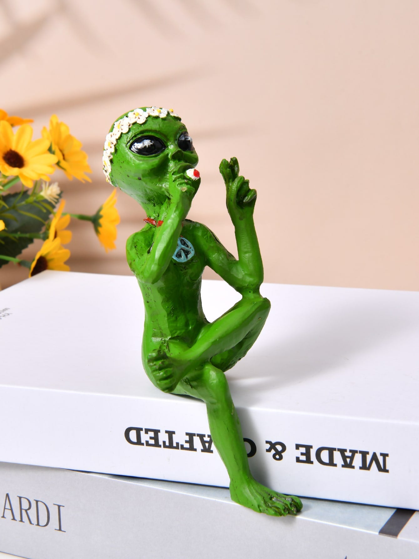The Galactic Garden Guardian is a unique addition to any home decor, making for a perfect Christmas gift. This resin figurine features a charming combination of an alien dwarf and an angel, providing a touch of whimsy and protection to any space. Crafted with expert precision, this figurine will be a conversation starter in any room.