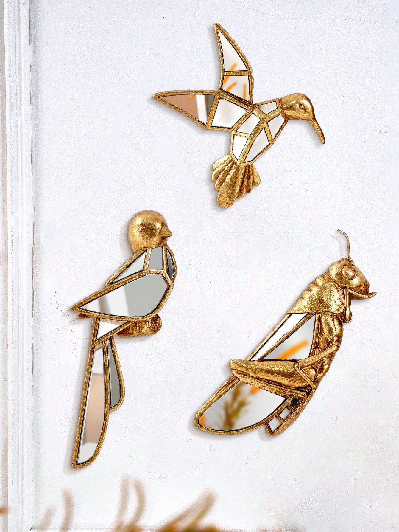 Expertly crafted Golden Sparrow Grasshopper - Resin Wall Decor is a must-have for bird enthusiasts. Made with high-quality resin, this collectable adds a touch of elegance and charm to any room. Display it proudly for a mesmerizing addition that is sure to spark conversations.