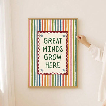 Striped Great Minds Grow Here classroom canvas poster displayed on a light wall