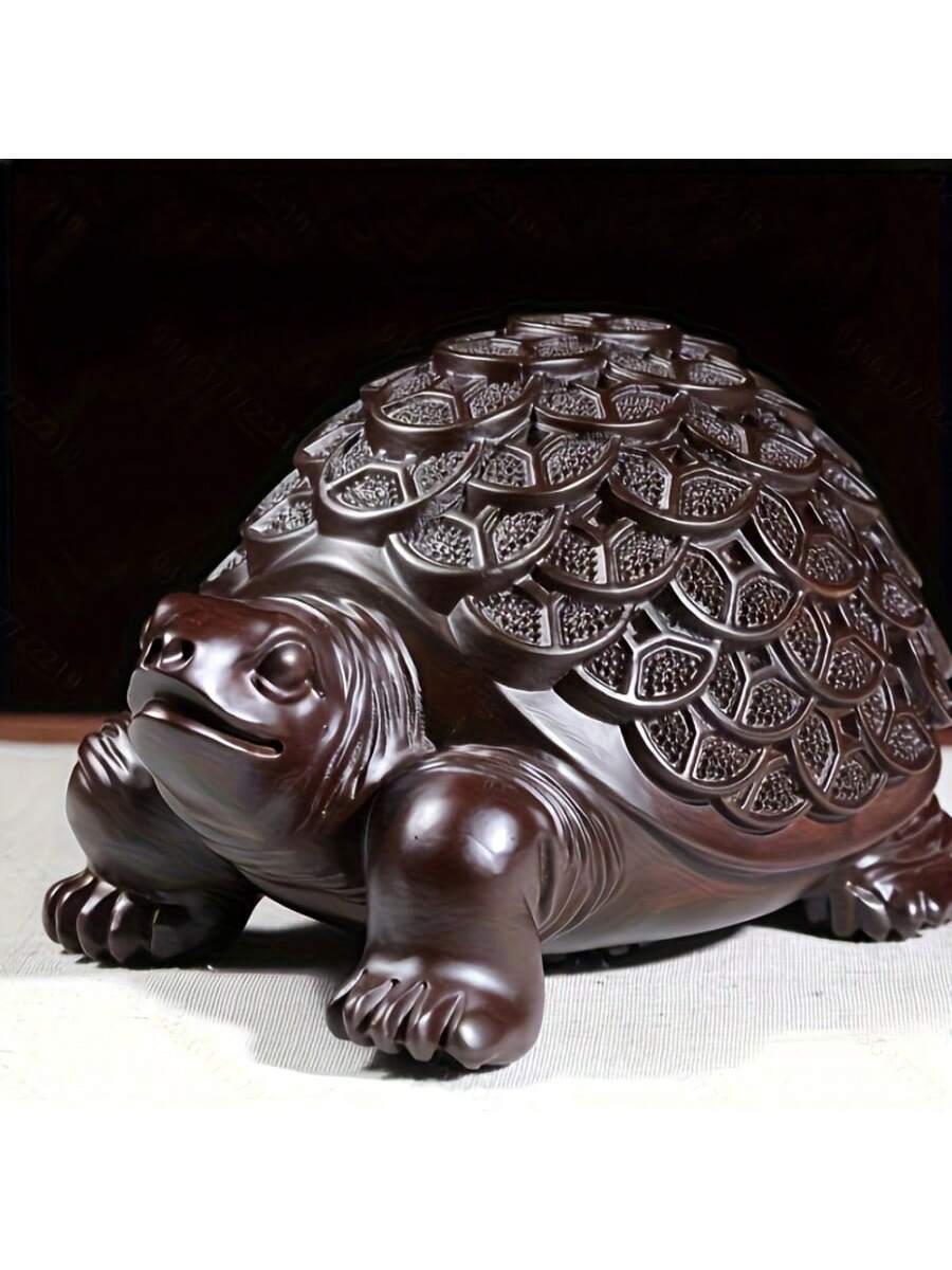 Elevate your home decor with our Hand-Carved Ebony Money Turtle Sculpture. This elegant Feng Shui wooden decor piece is expertly crafted to bring positive energy and abundance to any space. Made from high-quality ebony wood, this intricate turtle sculpture is a beautiful and beneficial addition to your home.