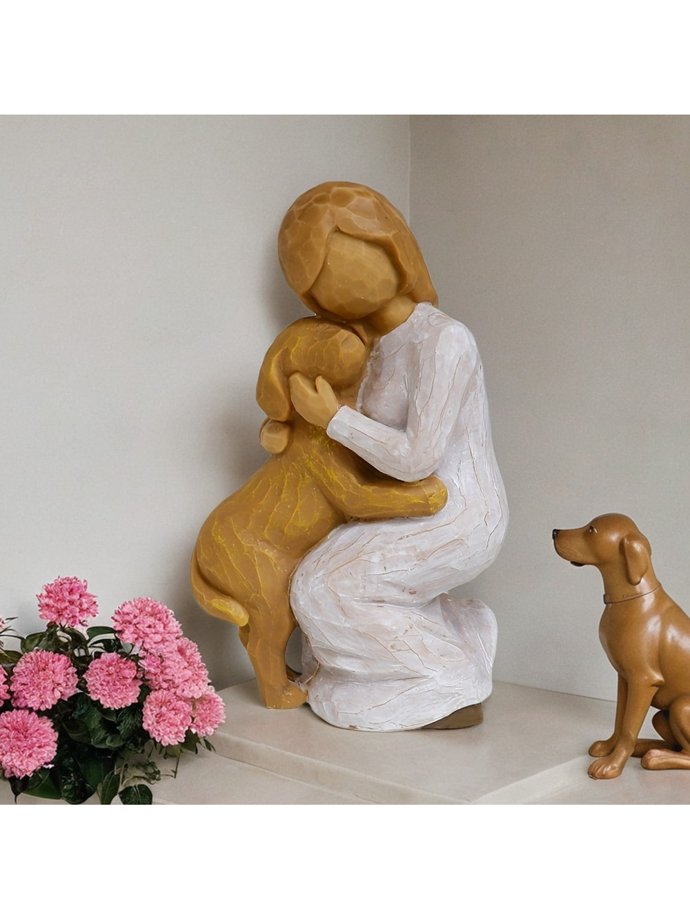 Honor your beloved pet with the beautiful Heartfelt Remembrance: Hand-Painted Angel Dog Statue. Hand-crafted and hand-painted with intricate details, this stunning statue serves as both a touching memorial and a lovely addition to your home decor. Keep the memory of your furry friend alive with this heartfelt symbol of love and remembrance.