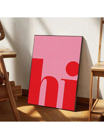Pink red hi typography canvas leaning on floor beside wooden chair