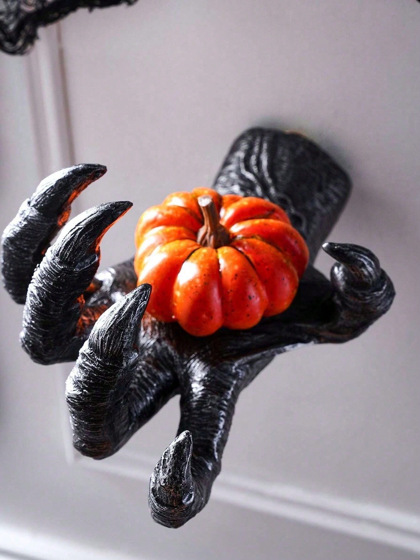 This resin claw pendant is perfect for adding a touch of horror to your Halloween home decor or costume jewelry collection. The intricate design and durable material make it a long-lasting addition to your spooky aesthetic. Get ready to scare with this versatile and unique piece.