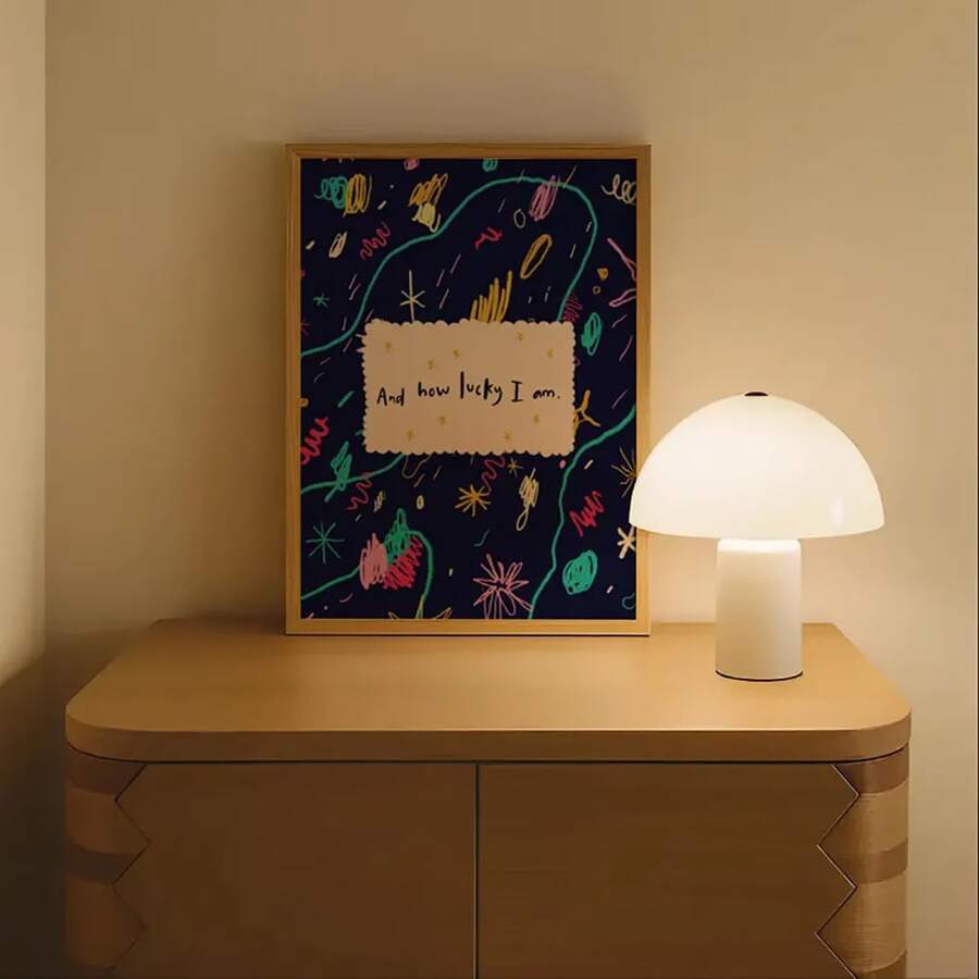 How lucky I am crayon poster on wooden cabinet