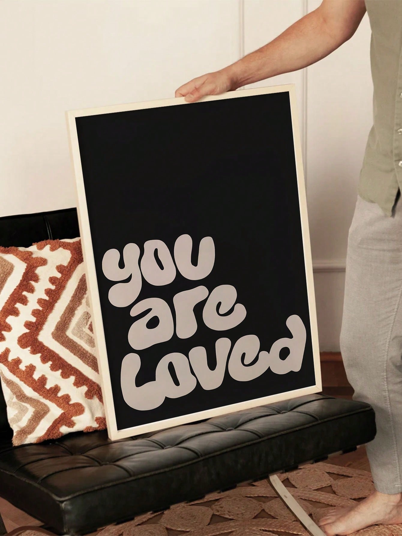 Elevate your home decor with our "You Are Loved" Black Affirmation Poster. This motivational wall art serves as a daily reminder of your worth, bringing positivity and inspiration to any room. Made with neutral colors, it seamlessly fits into any home aesthetic. Show yourself love with this powerful and uplifting piece.