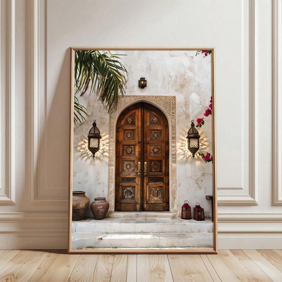 Light wood framed architectural print with carved arched double door lanterns white steps palm leaves pink flowers and red lanterns