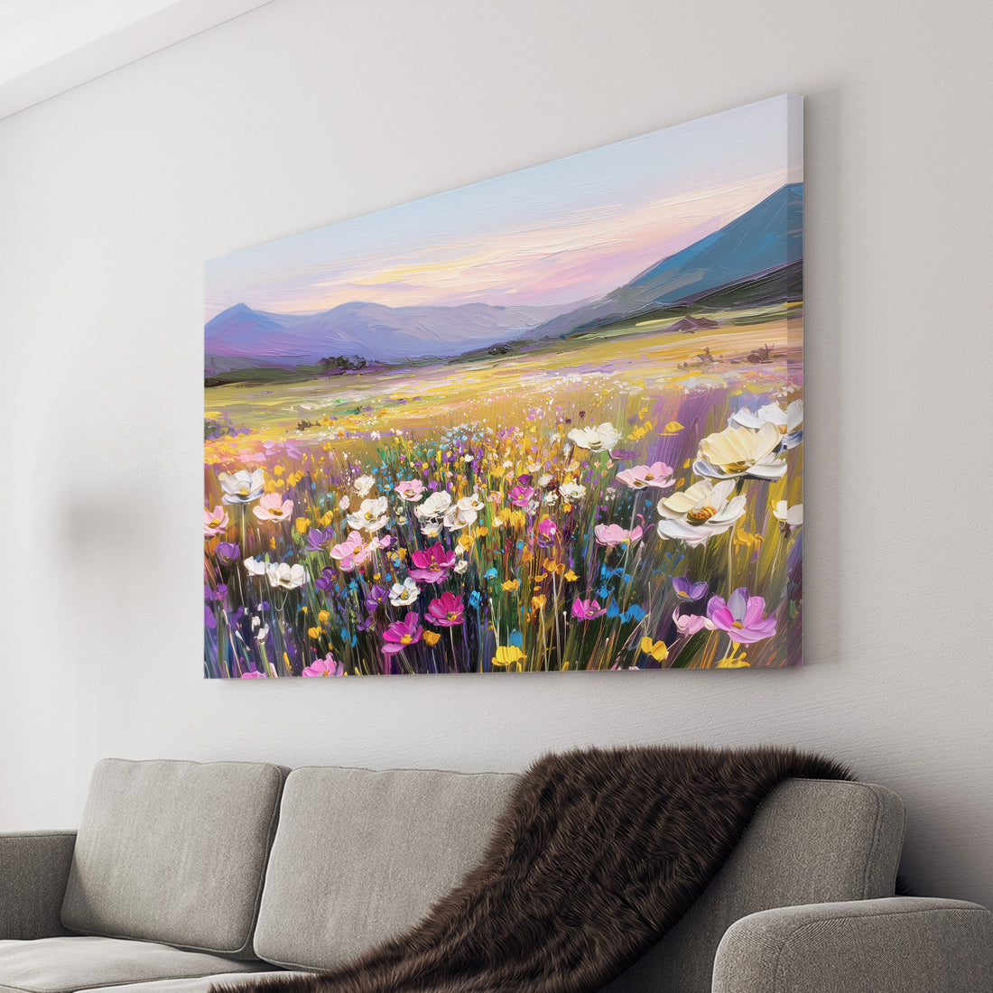 Transform your space with this stunning mountain wildflower field canvas, capturing the warm glow of a golden sunset across rolling peaks and vibrant blooms. The rich, layered landscape brings depth and movement to any room, making it an ideal focal point above your sofa, bed, or living area. 
