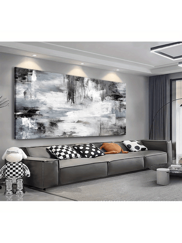 Elevate your space with this large gray and white abstract canvas wall art, expertly framed to complement modern interiors. Its subtle monochrome palette adds sophistication and depth, making it an ideal centerpiece for living rooms, bedrooms, or offices. Crafted to enhance elegance without overwhelming, this artwork seamlessly integrates with various decor styles, providing a refined visual impact that enriches