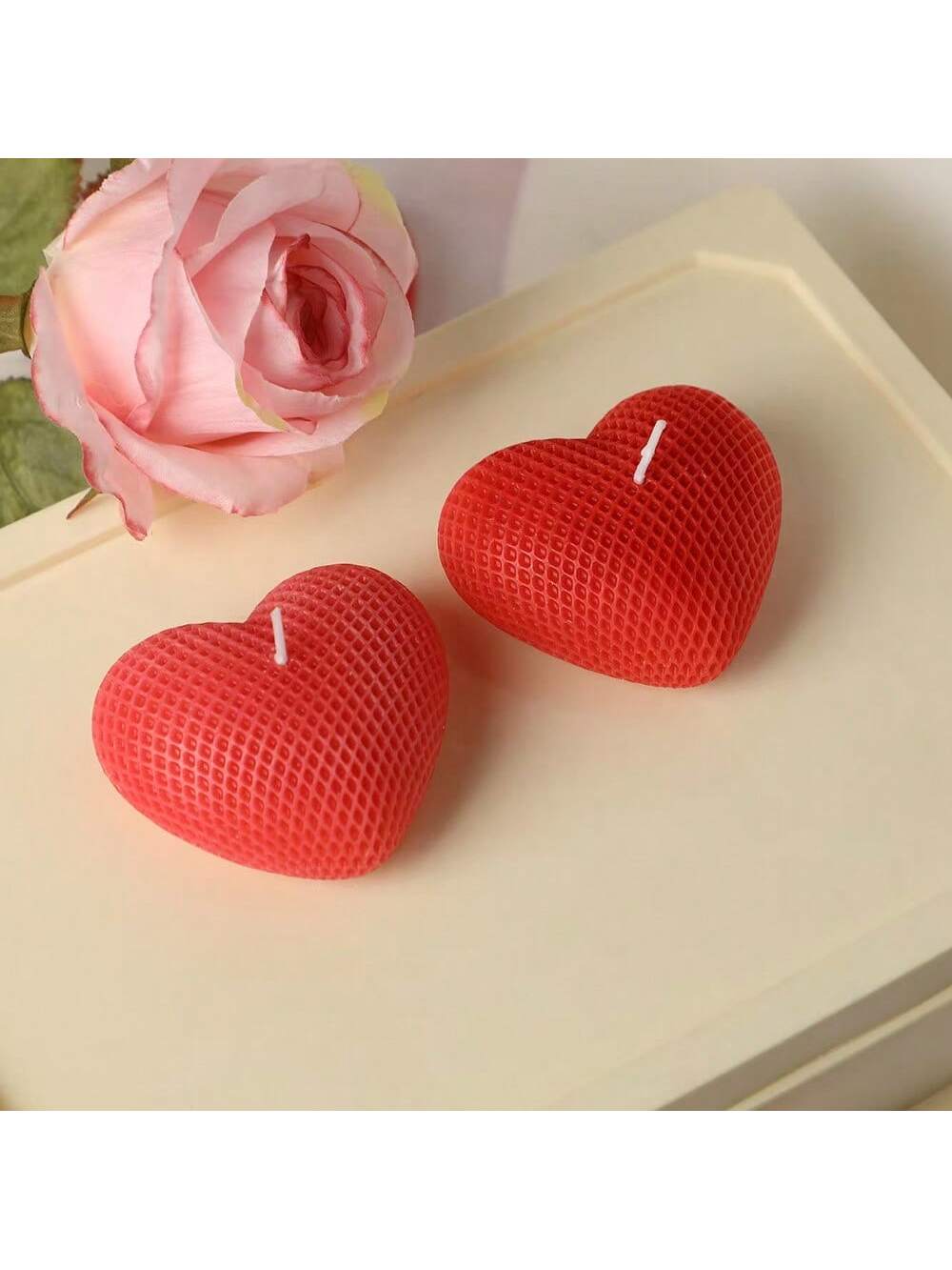 Enhance the ambiance of your home with our Love's Glow heart-shaped scented candle. Infused with romantic scents, this candle provides a warm and inviting atmosphere for your special moments. Illuminate your love and create the perfect romantic setting with Love's Glow.