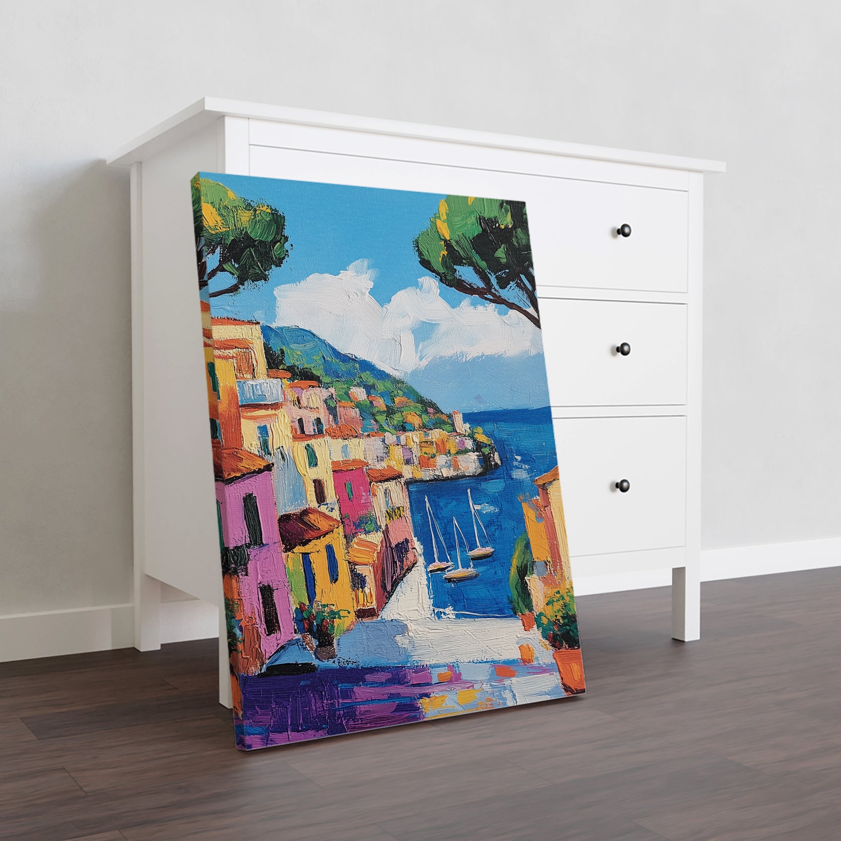 Transform your living room or bedroom into a seaside oasis with our Mediterranean Coastal Village Canvas Wall Art. The vibrant colors and detailed harbor scene featuring sailboats will transport you to the colorful Italian coast. Perfect for any room in your home, this canvas print will add a touch of seaside charm and relaxation.
