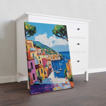 Transform your living room or bedroom into a seaside oasis with our Mediterranean Coastal Village Canvas Wall Art. The vibrant colors and detailed harbor scene featuring sailboats will transport you to the colorful Italian coast. Perfect for any room in your home, this canvas print will add a touch of seaside charm and relaxation.