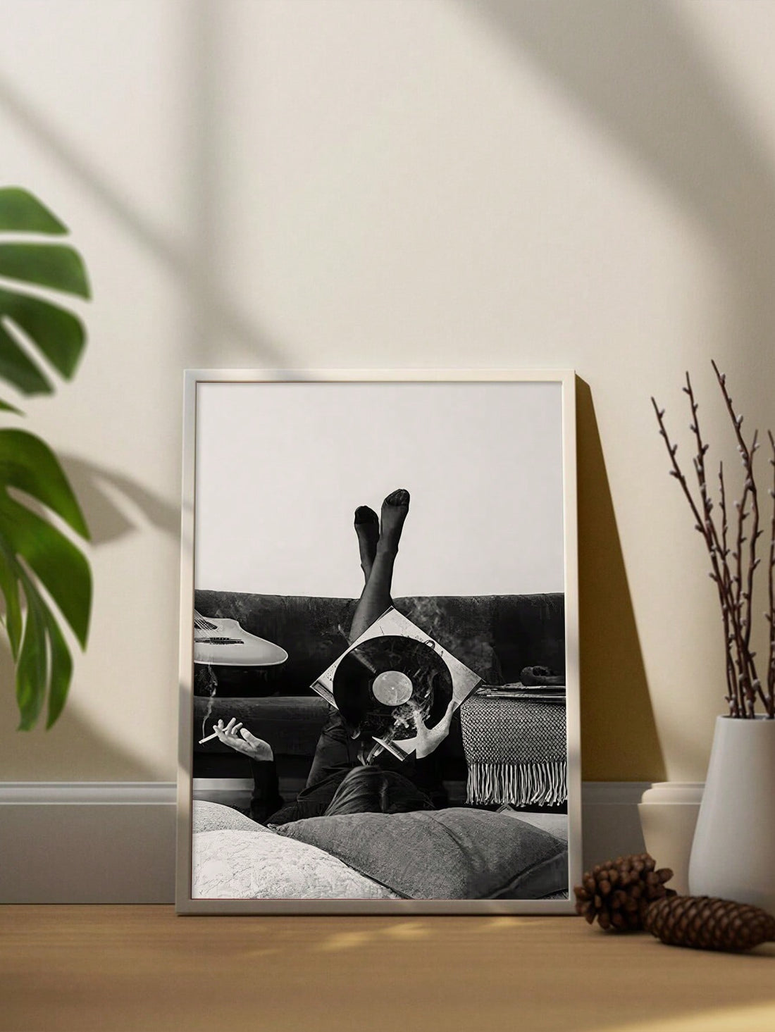 Elevate your space with this striking minimalist record art print, designed for discerning music enthusiasts. Rendered in sophisticated black and white, the clean geometric composition celebrates vinyl culture while maintaining timeless aesthetic appeal. The understated design complements modern, eclectic, and contemporary interiors seamlessly. Perfect for music rooms, studios, or living spaces seeking refined visual interest without overwhelming décor. This print captures the essence of analog passion thro