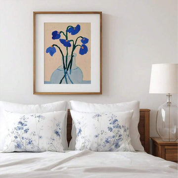 Blue floral wall art with vase and cobalt flowers