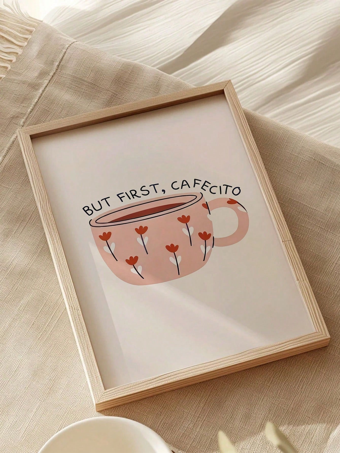 Elevate your kitchen or living room with this minimalist coffee canvas art print featuring the phrase "But First Cafecito." Its clean design and modern typography create a sophisticated focal point that complements contemporary interiors. Crafted for durability and vibrant display, this piece adds a subtle yet stylish reminder to savor your coffee moments. Ideal for coffee lovers seeking refined wall decor that blends simplicity with personality.