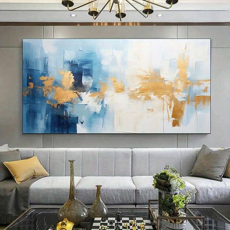 Transform your space with this striking modern abstract canvas art. Featuring bold blue and platinum tones, this frameless piece brings contemporary sophistication to any room. The graphic design creates visual interest while the waterproof canvas ensures lasting durability. Perfect for living rooms, bedrooms, or dining areas, it's an effortless way to elevate your décor without the commitment of framing. Versatile, stylish, and ready to hang.