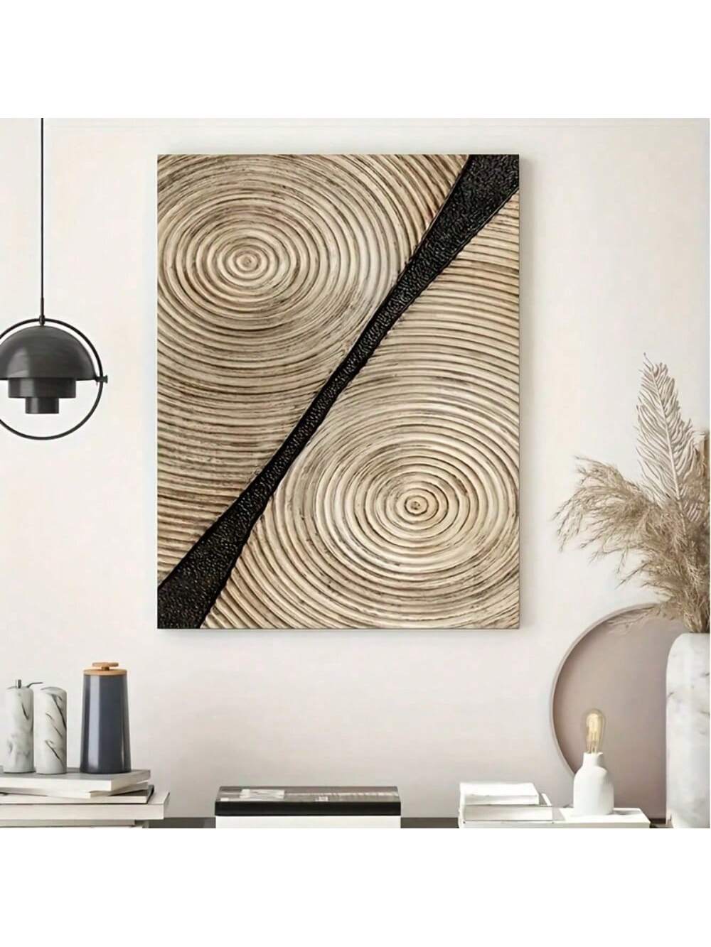 Transform your living space with this striking abstract wall art featuring bold geometric circles in sophisticated beige and black tones. The textured canvas surface adds depth and visual interest, creating a contemporary focal point that complements minimalist interiors beautifully. Perfect for modern homes, offices, or galleries seeking understated elegance with artistic impact. This piece balances simplicity with sophistication, making it an ideal choice for those who appreciate refined design aesthetics