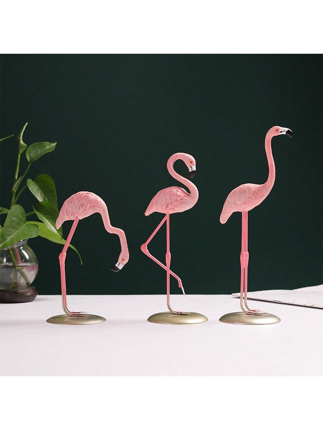 This Modern Art Pink Flamingo is the perfect desktop ornament for adding a touch of style to your home decor or for gifting to a loved one. With its unique design and vibrant color, it is sure to stand out and make a statement. Made of high-quality materials, it is both durable and visually appealing.