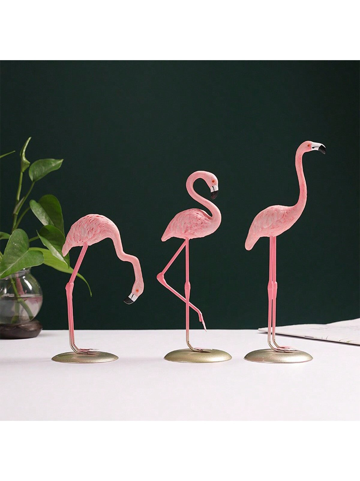 This Modern Art Pink Flamingo is the perfect desktop ornament for adding a touch of style to your home decor or for gifting to a loved one. With its unique design and vibrant color, it is sure to stand out and make a statement. Made of high-quality materials, it is both durable and visually appealing.