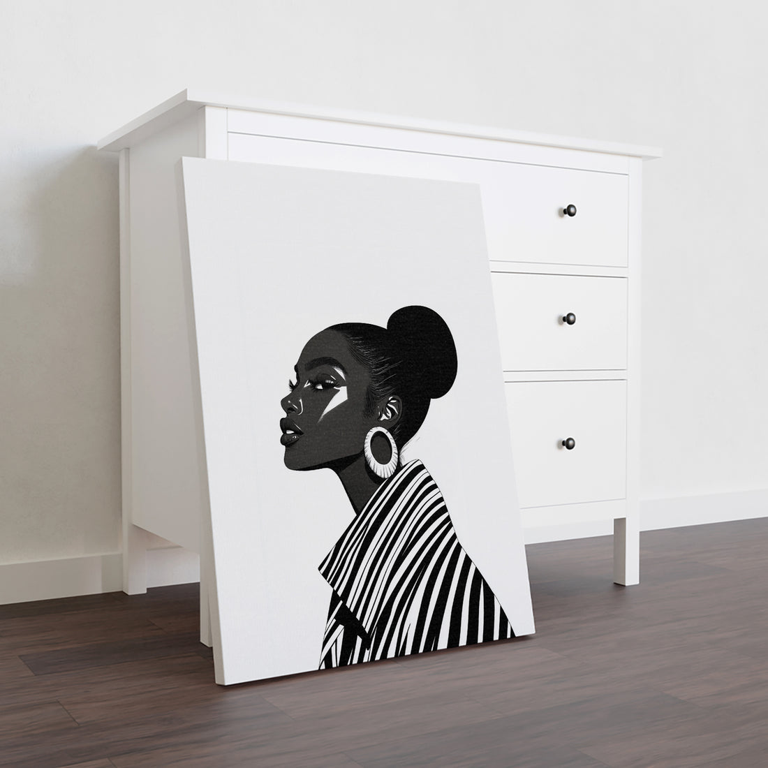 Elevate your living space with this Modern Black and White Fashion Portrait Canvas Wall Art. Designed to complement contemporary interiors, it serves as a striking focal point above sofas or bedside areas. The monochrome palette enhances any decor style, adding sophistication and visual interest without overwhelming the room. Crafted for durability and easy installation, this canvas art transforms your home with timeless elegance and refined aesthetic appeal.