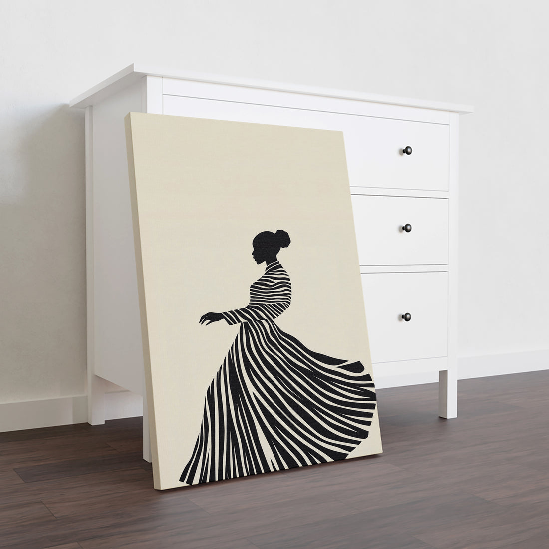 Elevate your living space with this Modern Black and White Striped Dress Silhouette Wall Art Canvas Print. Its sleek monochrome design adds a sophisticated focal point, perfect for enhancing your living room, sofa backdrop, or bedside area. Crafted on high-quality canvas, this piece offers durability and sharp detail, seamlessly blending contemporary style with timeless elegance to complement any home decor.