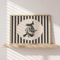 Halloween witch canvas poster with broom-riding silhouette and black striped border