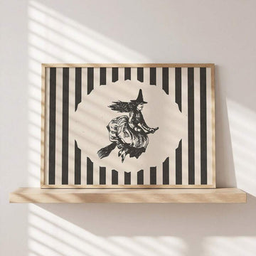 Halloween witch canvas poster with broom-riding silhouette and black striped border