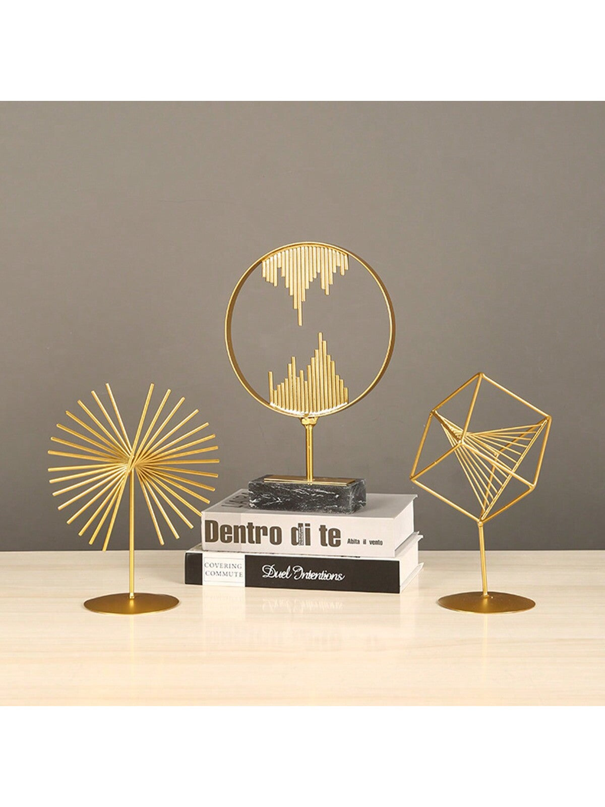 Upgrade your home and office decor with our Modern Metal Ornaments. Made with high-quality materials, they add a touch of luxury to any space. Display them proudly to elevate your interior design. Modern, sleek, and elegant, these ornaments are a must-have for every stylish space.