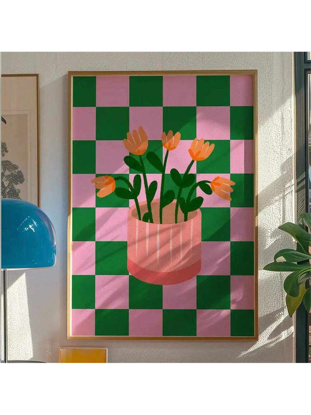 Elevate your interior with this contemporary floral wall art print, featuring a striking composition of vibrant orange blooms set against a soft pink and green checkered backdrop.
