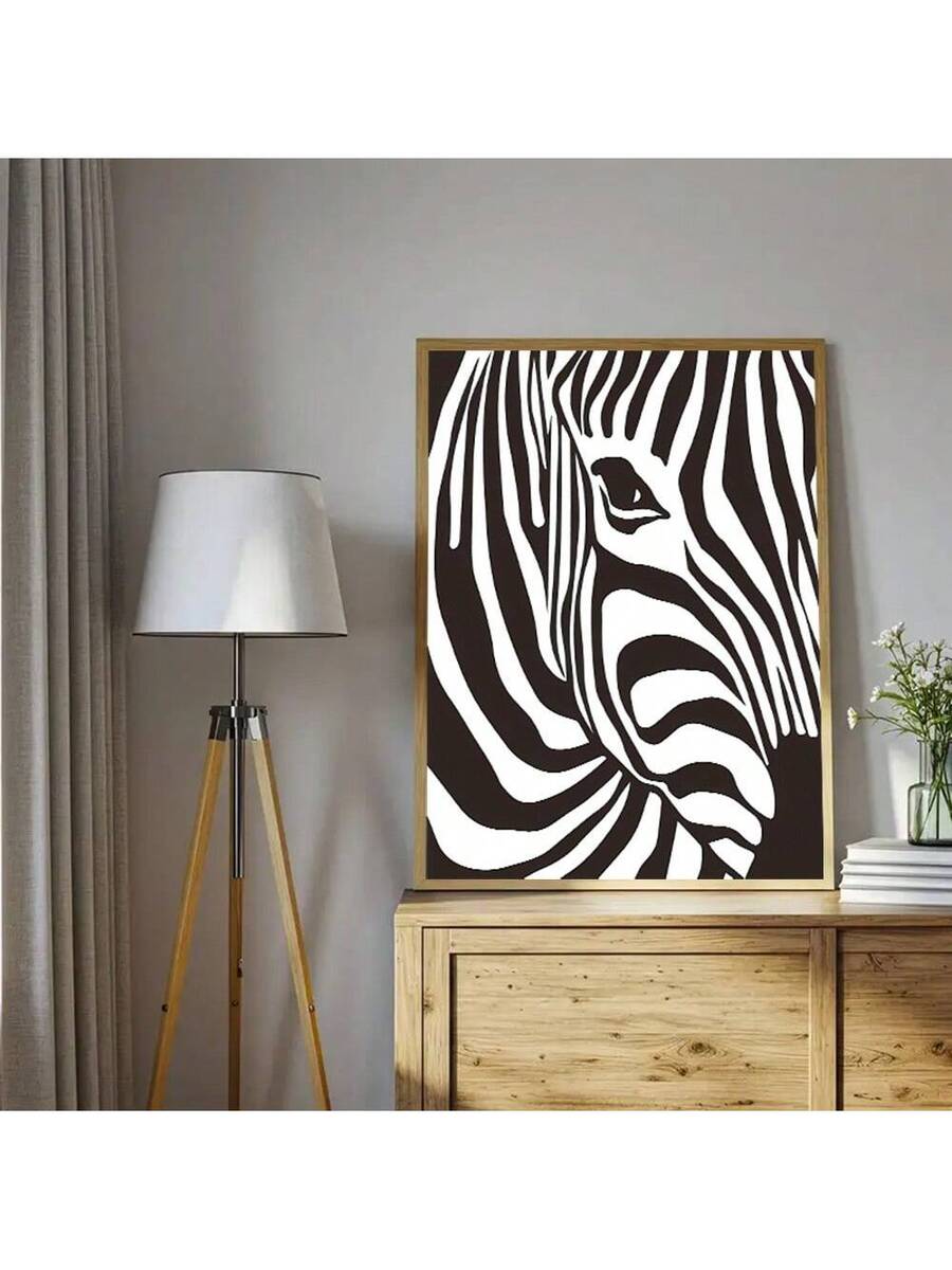Elevate your space with this striking minimalist zebra portrait canvas art. Featuring bold black and white abstract lines, this modern piece brings contemporary sophistication to any room. Crafted on premium canvas, it's waterproof and removable, making it perfect for renters and design enthusiasts alike. The unframed hanging design offers versatile styling options for your home office, bedroom, or living area. Transform your walls with artistic flair that complements any décor aesthetic.