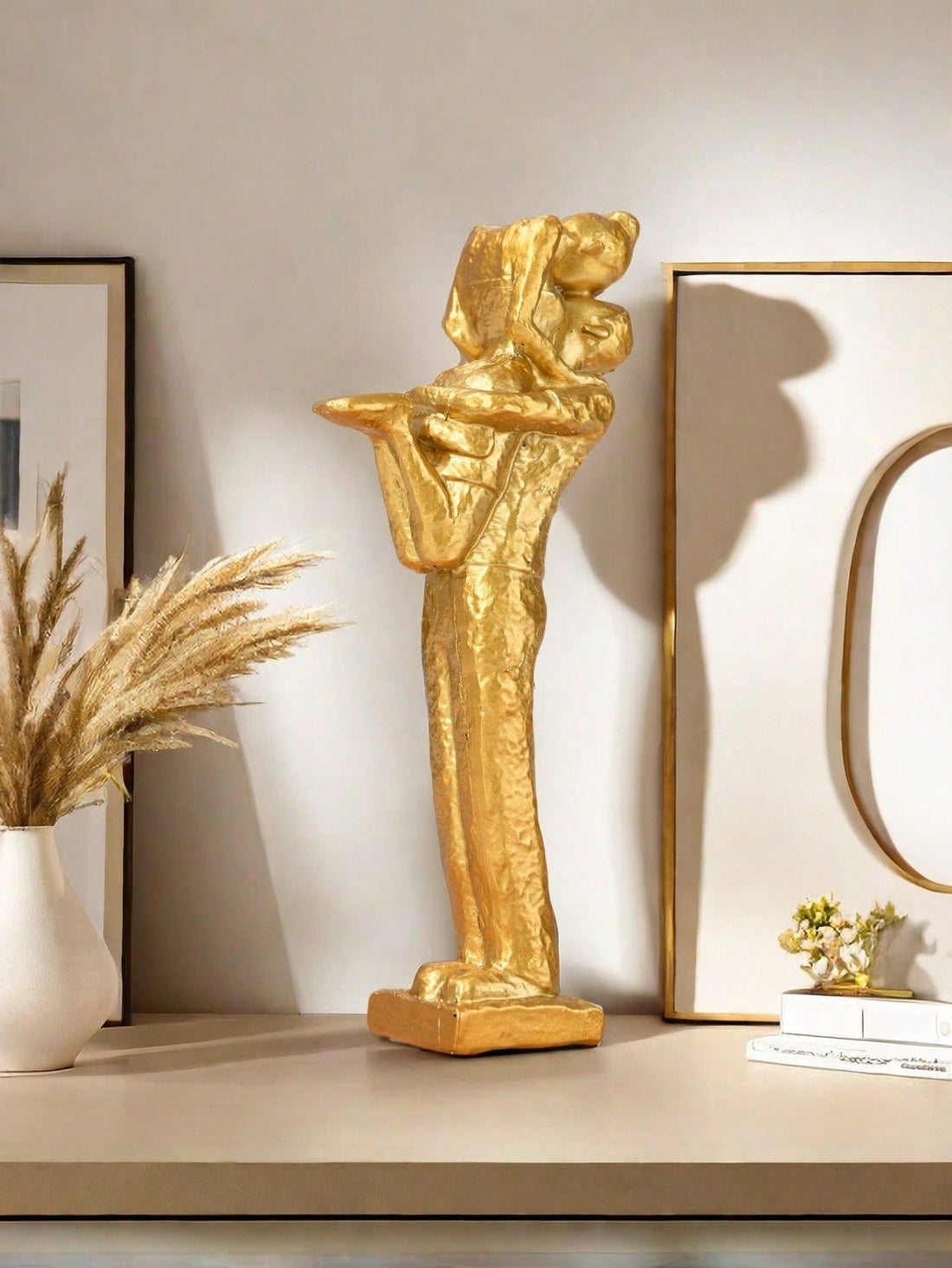 Add a touch of romance to your home decor with our Creative Resin Couple Hug &amp; Kiss Sculpture. Made with high-quality resin, this modern sculpture adds a unique and elegant touch to any room. Its intricate design showcases the beauty of love and affection, making it a perfect gift for your loved ones.