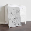 Elevate your interior with this contemporary canvas art piece, featuring delicate floral motifs rendered in sophisticated white tones against a textured background. The dimensional surface adds depth and visual interest, creating a refined focal point that complements modern and transitional décor styles. Versatile enough for living rooms, bedrooms, or entryway spaces, this artwork brings understated elegance to any wall.