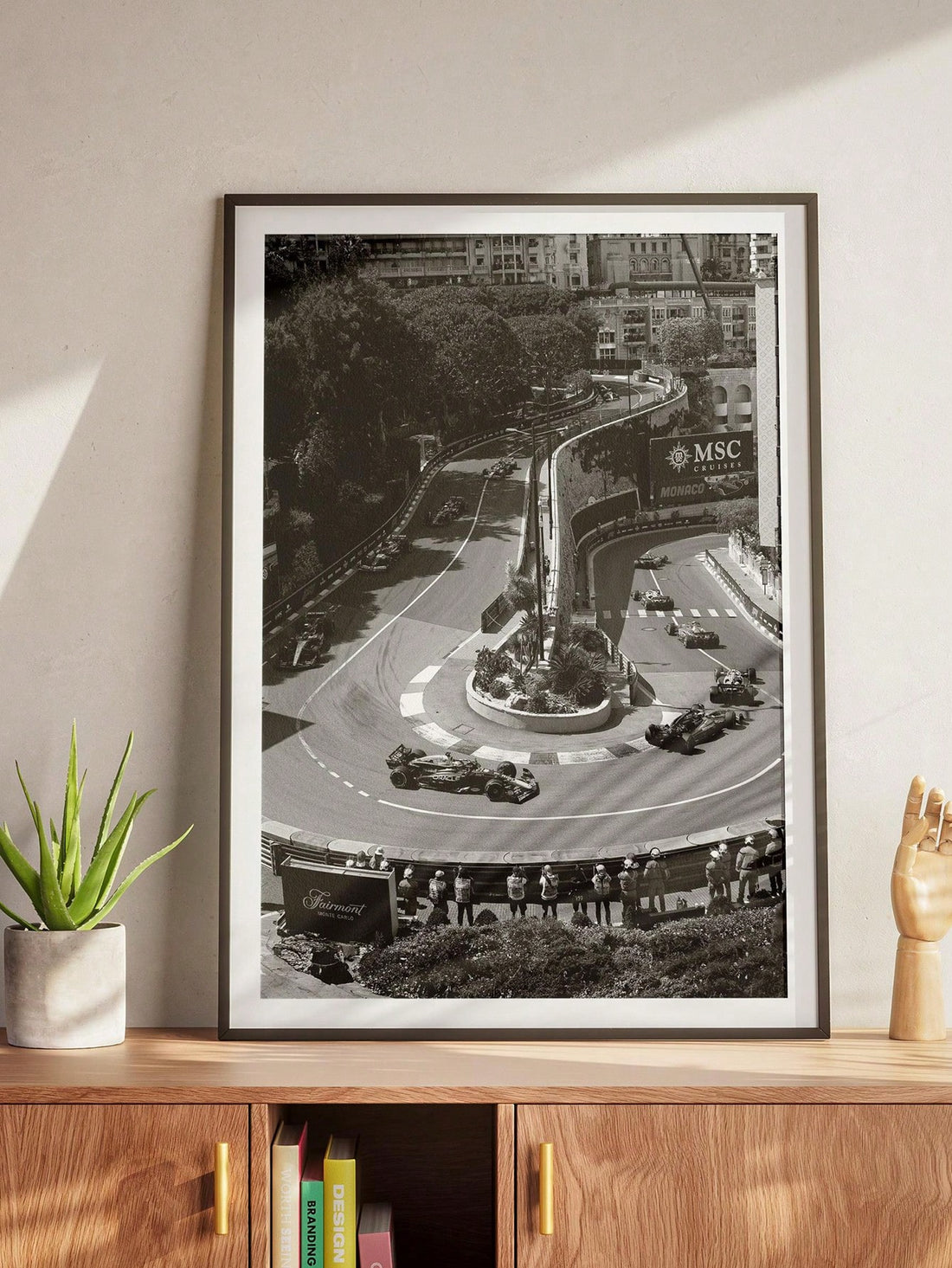 Celebrate the thrill of the Monaco Grand Prix with this black and white canvas wall art. Featuring a detailed depiction of the iconic racing track, it offers a sleek, minimalist design that enhances any room. Perfect for racing enthusiasts, this poster brings a touch of motorsport heritage to your space while maintaining a modern aesthetic. Durable canvas ensures longevity, making it a timeless piece for fans who appreciate both art and racing history.